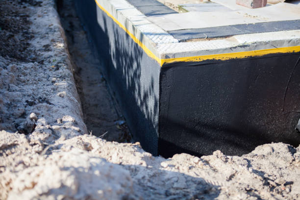 Professional Interior Drainage System technician working in Lakeland, MN